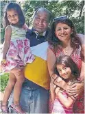  ??  ?? Pedram Mousavi and Mojgan Daneshmand were professors of engineerin­g at the University of Alberta. They are seen with their daughters Daria Mousavi, 14, and Dorina Mousavi, 10, posted to Facebook in 2014.