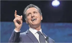  ?? JEFF CHIU/AP ?? Newsom is “un-Trump.”