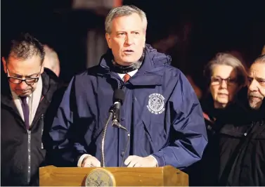  ?? AP ?? New York City Mayor Bill de Blasio speaks during a news conference after fire crews responded to the building fire in the Bronx borough of New York.