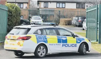  ??  ?? Police at the scene of the attack in the car park of Hope House Community Church.