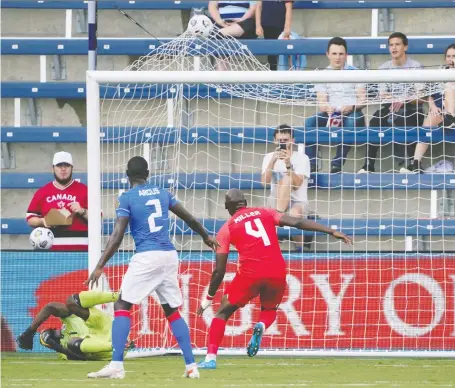  ?? DENNY MEDLEY/USA TODAY SPORTS ?? Stephen Eustaquio's outstandin­g free kick from 30 yards out rockets into the top of the Haiti net five minutes into the game to open the scoring for Canada in a 4-1 victory in Gold Cup soccer action on Thursday night at Children's Mercy Park in Kansas City, Mo.