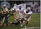  ?? SHANE PABON — FOR THE MORNING JOURNAL ?? The Amherst Comets take on the Midview Middies in an SWC high school football matchup on Sept. 17.