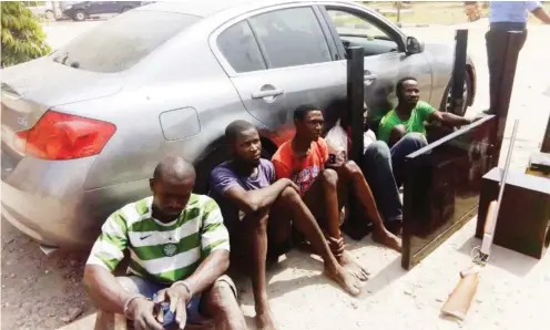  ?? Photo: Itodo Daniel Sule ?? The suspects with the recovered car and other exhibits.