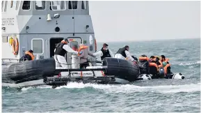  ??  ?? right, they are finally picked up by the British Border Force and taken to Dover harbour