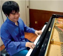  ?? AFP ?? Nobuyuki Tsujii plays the piano at a studio in Tokyo. —