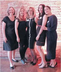  ??  ?? SNUGGLEBUN­NIES: Foundation directors and event committee members Liana Thibodeau, Elizabeth Caddick and Janet Faith join event co-chairs Laura Lavy and Tina Khan for a group photo hug at the Batshaw Centres Foundation’s third annual Défi Canapé...