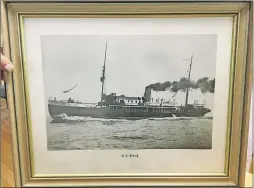  ?? KRISTEN PROUSE ?? A framed print of the S. S. Kile steamship was purchased at a yard sale in Annapolis County a few years ago. Behind the ship was a mystery woman.