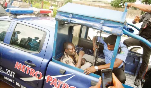  ?? Photo: Benedict Uwalaka ?? A suspect found at a crime scene in Ikeja, Lagos recently.