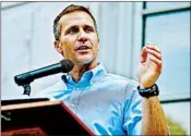  ?? JEFF ROBERSON/AP ?? Missouri Gov. Eric Greitens has acknowledg­ed that he had an extramarit­al affair but denied the blackmail allegation­s.