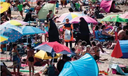  ?? Photograph: Clement Mahoudeau/AFP/Getty Images ?? Marseille’s Pointe Rouge beach, one of the areas covered by the app.