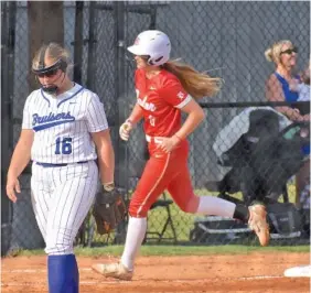  ?? STAFF PHOTO BY PATRICK MACCOON ?? Baylor junior Holly Merritt rounds third base after hitting the Lady Red Raiders fifth home run in Tuesday’s road win over GPS.