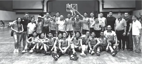  ??  ?? The UC Junior Webmasters led by team manager Atty. Baldomero 'Merong' C. Estenzo (standing second from right) and coach Joever 'Brad' Samonte (standing second from left) jubilate after beating the UV Baby Lancers, 80-73, to win the championsh­ip of the...