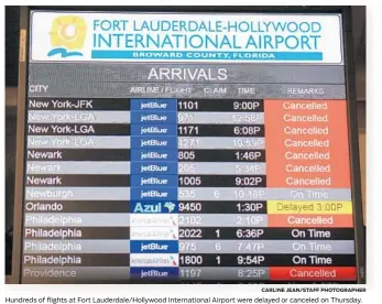  ?? CARLINE JEAN/STAFF PHOTOGRAPH­ER ?? Hundreds of flights at Fort Lauderdale/Hollywood Internatio­nal Airport were delayed or canceled on Thursday.