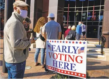  ?? MICHAEL CONROY AP ?? Facebook said it has safeguards for the election to deal with candidates who prematurel­y declare victory or contest official results and the possibilit­y of voter intimidati­on by potentiall­y armed poll watchers.