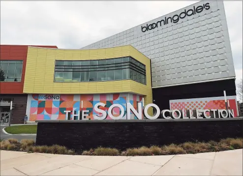  ?? Erik Trautmann / Hearst Connecticu­t Media ?? Shoppers patronize the SoNo Collection mall in Norwalk. Connecticu­t retailers saw a surge of activity in March at about the same time that stimulus checks went out from the federal government.