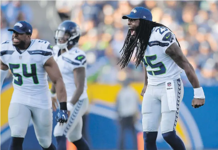  ?? — AP ?? Seahawks cornerback Richard Sherman shouts from the sideline as his team opened the NFL pre-season with a 48-17 win over the Los Angeles Chargers on Sunday.