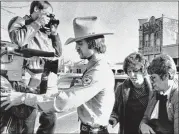  ?? TED POWERS / AP 1984 ?? Genene Jones (second from right) is escorted into the Williamson County Courthouse in Georgetown in 1984. Jones, an ex-nurse, has been serving a 99-year sentence for the fatal overdose of an infant.