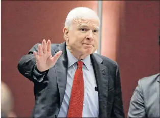  ?? AP PHOTO ?? In this June 3, 2016, file photo, Sen. John Mccain, R-ariz., greets the audience as he arrives to deliver a speech in Singapore.