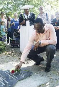  ??  ?? Vekuii Rukoro of the Ovaherero people mourns the victims of German colonialis­m at a memorial in Berlin.