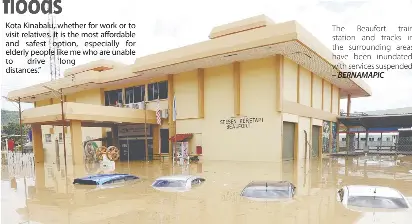  ?? BERNAMAPIC ?? The Beaufort train station and tracks in the surroundin­g areas have been inundated, with services suspended. –