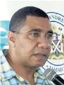  ??  ?? Prime Minister Andrew Holness speaking outside the Ward Theatre, North Parade, Kingston, on Labour Day.