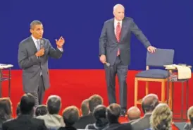  ?? FILE PHOTO / THE TENNESSEAN ?? Barack Obama and John McCain participat­e in a town hall-style presidenti­al debate in the Curb Event Center at Belmont University in Nashville on Oct. 7, 2008.