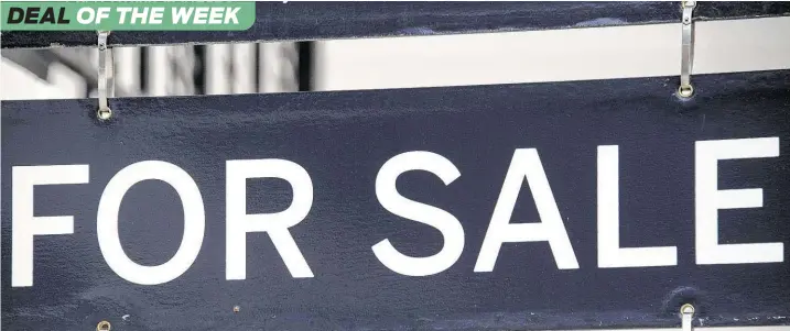  ?? Nicholas Kamm / AFP/Getty Images file ?? Connect Realty and Clayton Nash Real Estate are the latest real estate brokers to announce plans to merge.