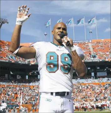  ?? Associated Press ?? Jason Taylor was given the microphone at SunLife Stadium in Miami Jan. 1, 2012 — the day of his final NFL game.