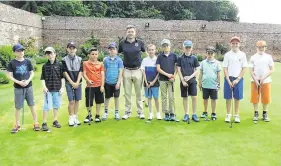  ??  ?? Bridging the gap: Craig Lewis (Developmen­t Coach) with his panel on the putting green at Greystones