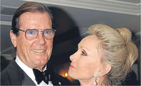  ?? Picture: PA. ?? Sir Roger Moore and his wife Kristina. The former James Bond actor died yesterday in Switzerlan­d.