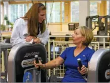  ?? SUBMITED PHOTO — ACAC FITNESS & WELLNESS CENTER ?? A nurse is working with an acac member during a session at the fitness club. The wellness center offers a Physician Referred Exercise Program to help jump start patients with a fitness routine.