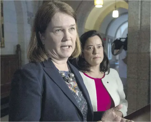  ?? ADRIAN WYLD / THE CANADIAN PRESS ?? Health Minister Jane Philpott, left, and Justice Minister Jody Wilson-Raybould shepherded the assisted dying bill into existence at breakneck speed, under threat of a June 6 Supreme Court deadline that had come and gone.