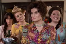  ?? AMAZON CONTENT SERVICES ?? Camila Cabello, left, Charlotte Spencer, Idina Menzel and Maddie Baillio appear in a scene from “Cinderella.”