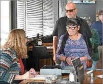  ?? NICK SMIRNOFF / FOR TEHACHAPI NEWS ?? Chamber members and local business owners Mei Mei and Mano Lujan arrive at the Greater Tehachapi Chamber of Commerce monthly luncheon for January 2023.