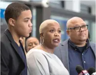  ?? ASHLEE REZIN/SUN-TIMES ?? LEFT: Cleo CowleyPend­leton (with son Nathaniel Pendleton Jr. and husband Nathaniel Pendleton) speaks to reporters after the sentencing.