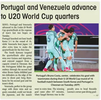  ??  ?? Portugal's Bruno Costa, center, celebrates his goal with teammates during their U-20 World Cup round of 16 football match between South Korea and Portugal in Cheonan on Tuesday. (AFP)