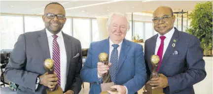  ?? ?? Tourism Minister Edmund Bartlett (right) with Director of Tourism Donovan White (left) and Graham Cooke, founder, World Travel Awards, at this year’s staging of the event in Dubai.