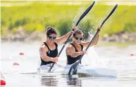  ?? Picture / Photosport ?? Aimee Fisher and Lisa Carrington won gold in the K2 200m and 500m at the opening World Cup in Portugal last weekend.