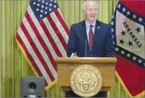  ??  ?? Arkansas Gov. Asa Hutchinson speaks to reporters in Little Rock on Monday in this screengrab of video provided by the governor’s office.