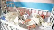  ?? PTI ?? Newborn babies lie in their beds at the Ataturk Children's Hospital a day after they were rescued from a deadly attack on maternity hospital, in Kabul, Afghanista­n, Wednesday