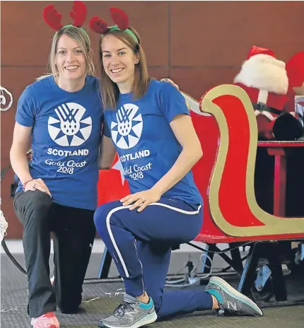  ?? Picture: PA. ?? Festive fun for Eilidh Doyle, left, and Steph Twell at the Team Scotland track and field athletes announceme­nt at Stirling University yesterday.