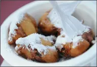  ??  ?? Lodi News-Sentinel staff tried the deep-fried Oreos from The Funnel Cake Express at the Lodi Grape Festival on Thursday.