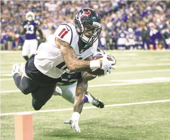  ?? Brett Coomer / Houston Chronicle ?? Jaelen Strong (11) lunges past Colts linebacker D’Qwell Jackson (52) to finish off an 8-yard, fourth-quarter touchdown reception that put the Texans ahead for good.