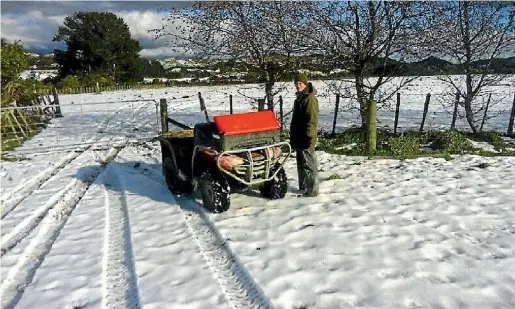  ??  ?? Pohangina Valley farmer Tony Gray is still waiting for the snow to clear.