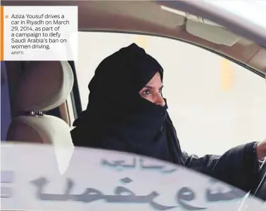  ?? AP/PTI ?? Aziza Yousuf drives a car in Riyadh on March 29, 2014, as part of a campaign to defy Saudi Arabia’s ban on women driving.