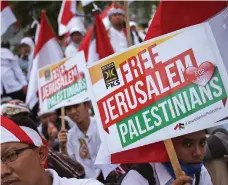  ?? AFP ?? Protesters in Indonesia on Sunday, where demonstrat­ors took to the streets in sympathy for Palestinia­ns