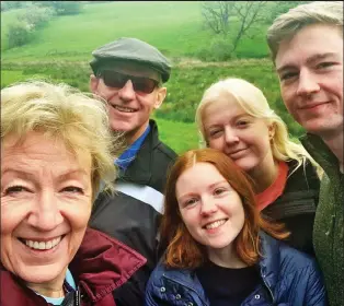  ??  ?? Selfie: Mrs Leadsom in a group with Ben, Charlotte (at back) and Freddie