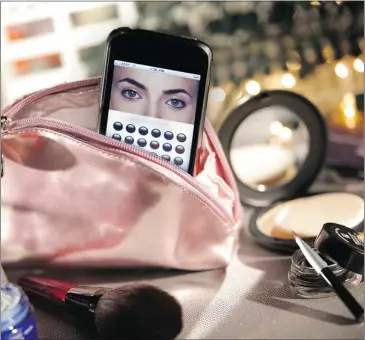  ?? TONY CENICOLA/ THE NEW YORK TIMES ?? With iPhone beauty apps, you can check your makeup, shop for products or window shop while at home or on the go.