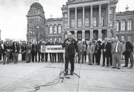  ?? LILY SMITH/THE REGISTER ?? Jesse Case, secretary-treasurer of Teamsters Local 238 of Iowa, delivers remarks surrounded by supporters and members of the Iowa Legislatur­e during a Teamsters demonstrat­ion at the Iowa State Capitol on Feb. 21.