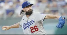  ?? AP photo ?? Dodgers pitcher Tony Gonsolin throws during the first inning of Los Angeles’ 8-3 win over Kansas City on Friday.